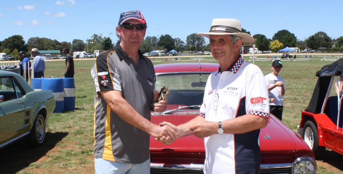 The Bob Spackman Memorial Trophy was awarded to the '64 EH Holden owned by Cliff Staff by Barry Jamiseon of Spackman Motors Crookwell. 