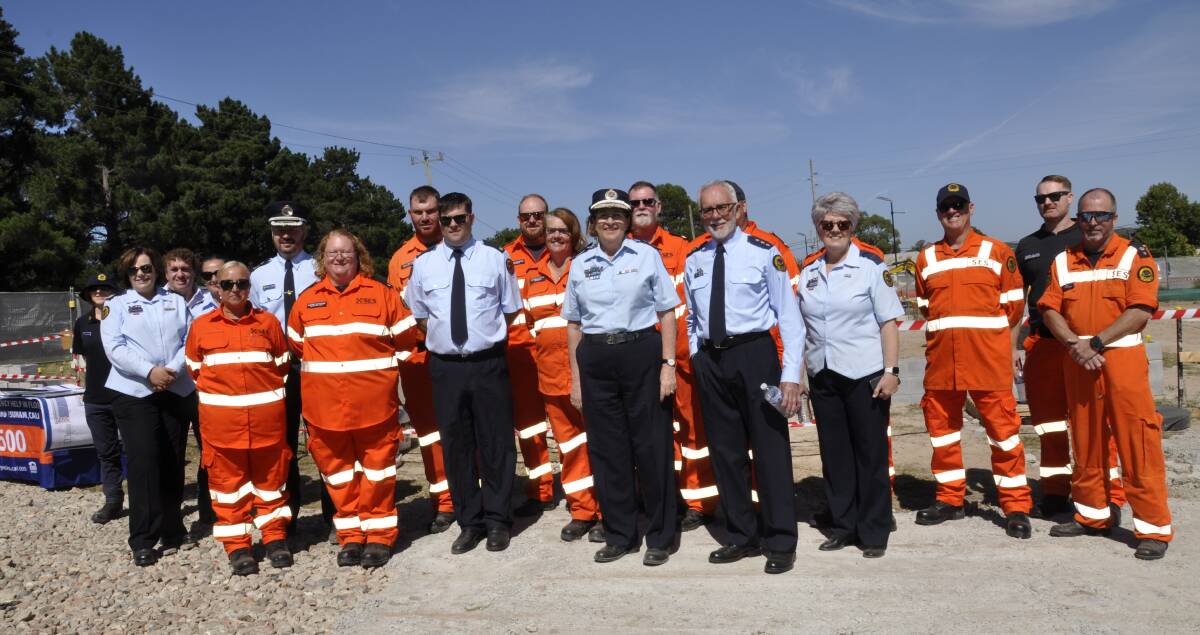 NSW SES commissioner Carlene York, Goulburn unit commander, Stve Watson with staff and volunteers at Tuesday's sod turning event for the new SES centre. Picture by Louise Thrower.