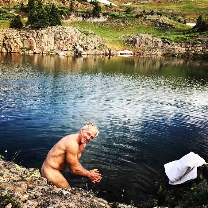 Greg Norman taking a bath after a two-day horse ride, 11,850-feet above sea level in the Colorado Flat Top Wilderness. Photo: Instagram/@shark_gregnorman