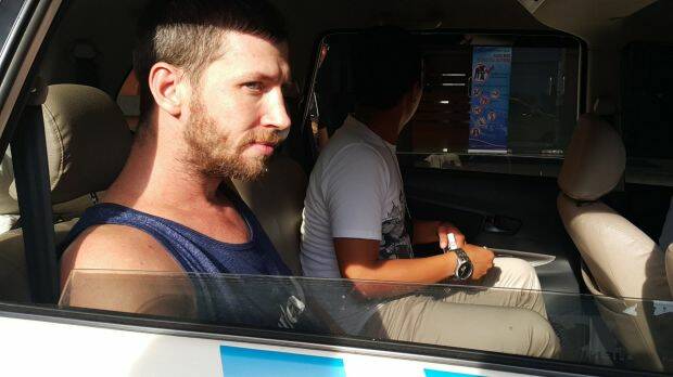 Shaun Edward Davidson waiting to be transferred to Kerobokan jail in Bali after being charged with possessing another person's identity and overstaying his visa in April last year. Photo: Amilia Rosa
