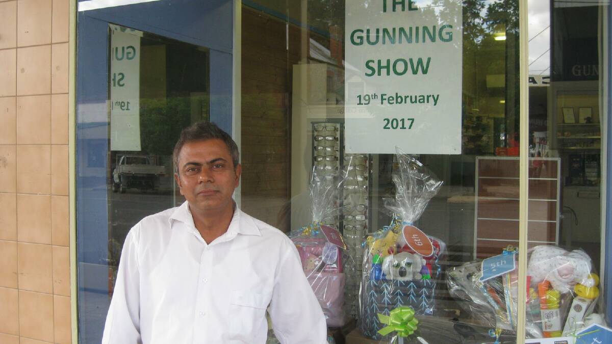 Gunning pharmacist Jaideep Sharma was happy to help by displaying Show raffle prizes in his shop window.  He hopes to win the first prize of a year's family membership to the National Zoo and Aquarium!