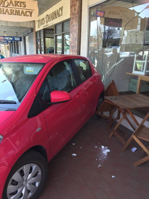Damage: The front of Crossroads Cafe after a car driver mounted the footpath on Tuesday. The driver and cafe patrons were unhurt. Photo: Amanda Young