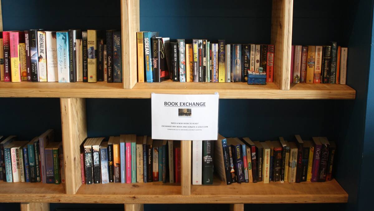 A large range of books is ready to be exchanged at the Crossroads Cafe. Titles include novels, autobiographies, fiction and non-fiction. Photo: Bronwyn Haynes