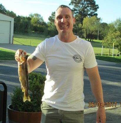 CAUGHT: Mark George with the single trout entry. Photo Brenda Carney.