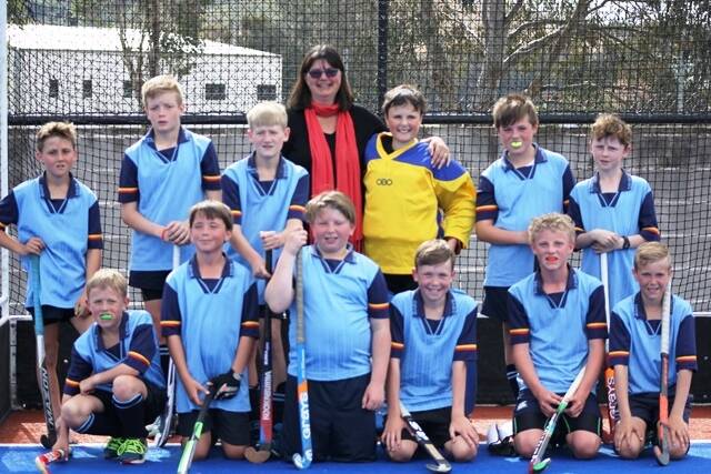 GREAT ACHEIVMENT: Coach Megan McGregor with Crookwell Public School Boys Hockey team who came third in the state in the NSW PSSA Boys Hockey Competition.
