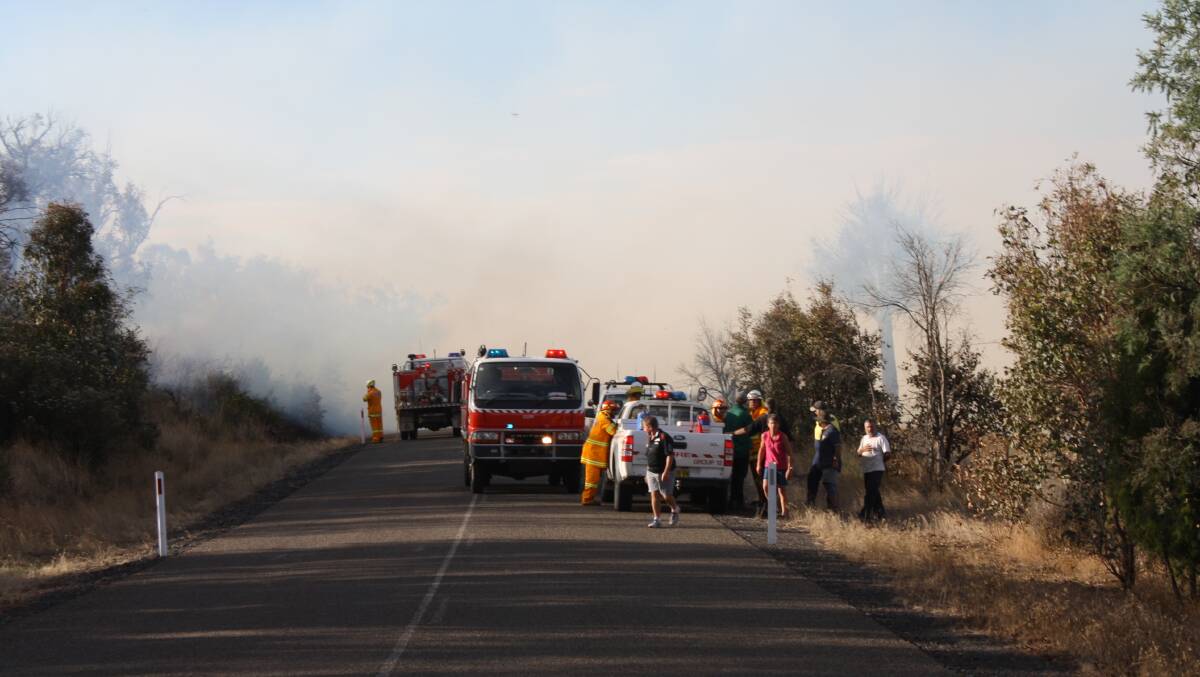 A grass fire burnt about 29 hectares north of Laggan on Friday afternoon. Photos: Bronwyn Haynes