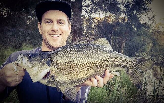 BEAUTY: Recreational fisher, Blake Fallon showing off an Australian Bass. Photo supplied.