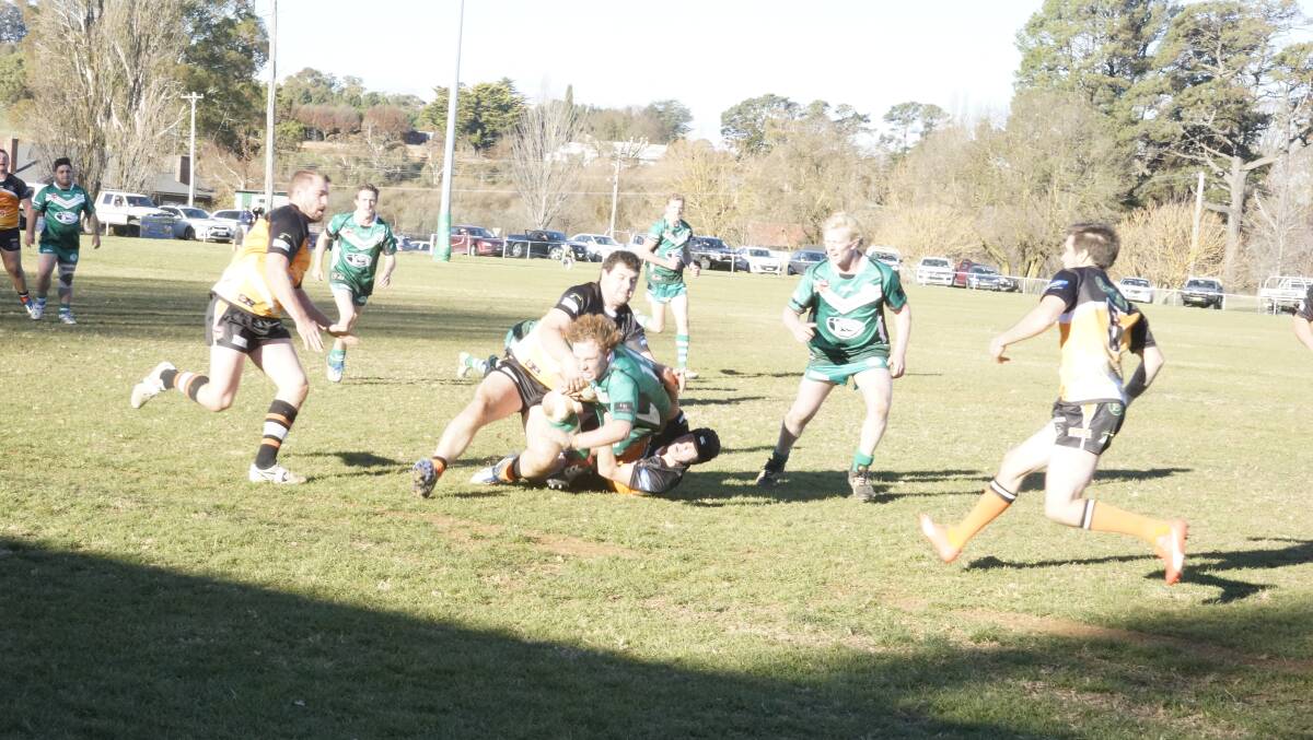 DETERMINATION: A Crookwell Devils player determined to get the ball across the line in a recent match on home soil. Photo Paul Anderson.