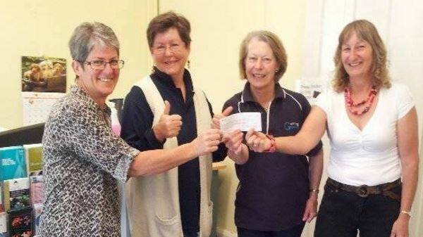 Gunning Patchwork weekend organisers Peta Luck, Margaret Jenkinson and Maree Roche presenting a cheque for $1500 towards the Seniors Housing project to Gunning Community Care executive officer Wendy Shannon (second from right).