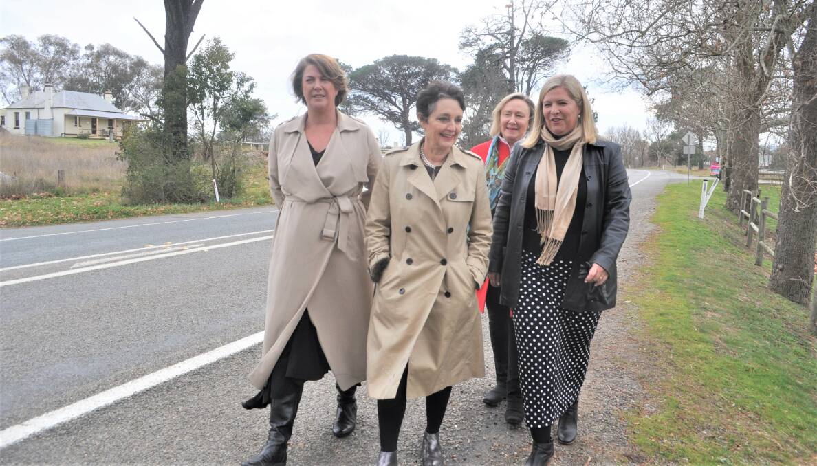 STATE BOOST: Minister for Roads, Maritime and Freight Melinda Pavey  with MP Pru Goward, Yass Valley mayor Rowena Abbey and Bronnie Taylor MLC along Barton Highway in Murrumbateman. Photo: Toby Vue