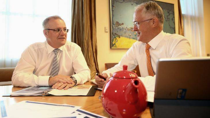 Prime Minister Malcolm Turnbull and Treasurer Scott Morrison in the Prime Minister's suite on Monday morning, budget eve. Photo: Andrew Meares