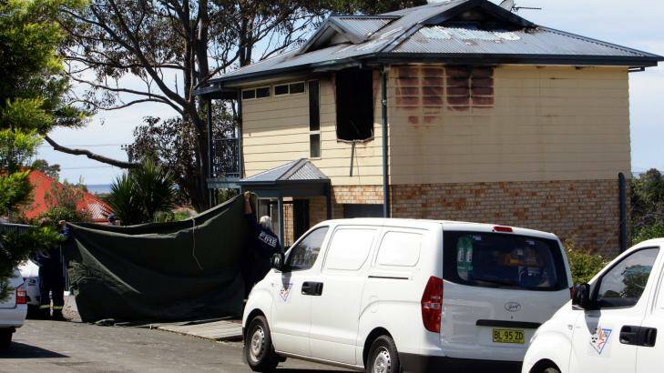 The burnt out home set alight by her killers. Photo: Kirk Gilmour