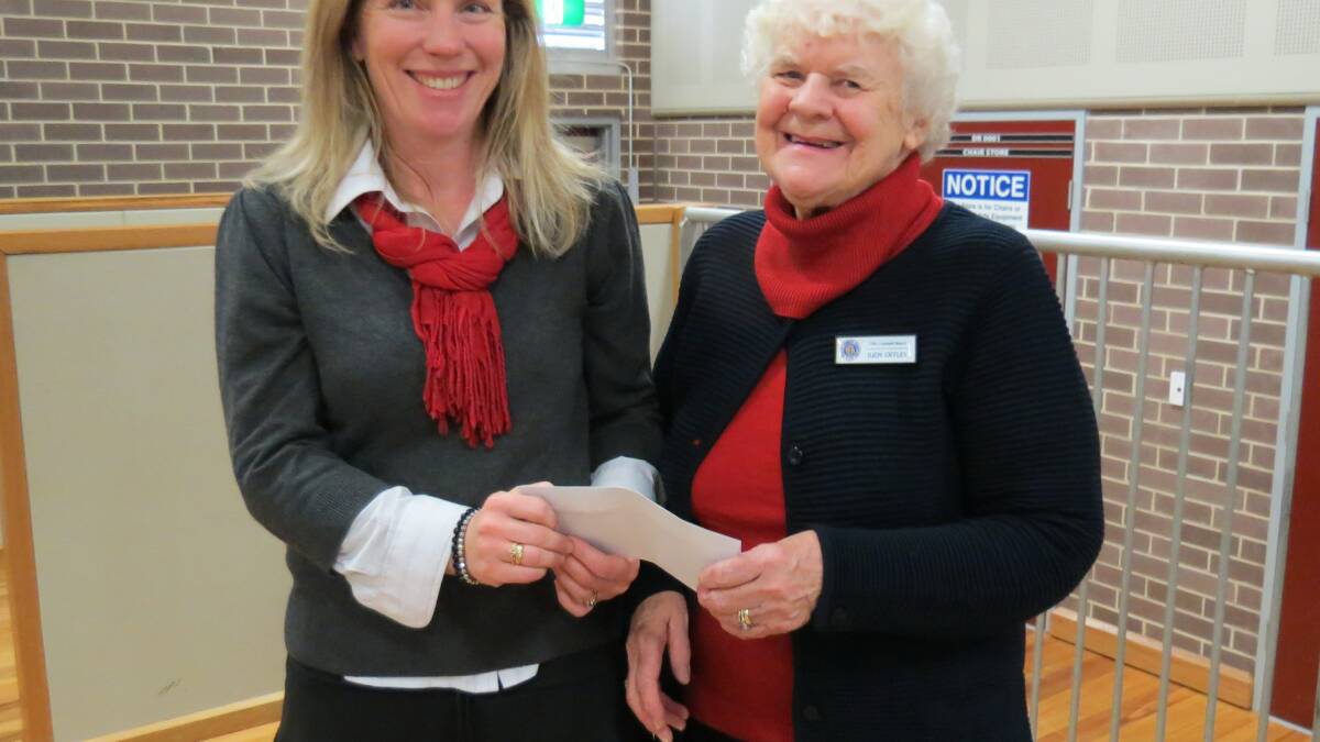 Wendy Lyons receiving the CWA Cheque from Judy Offley, Treasurer, Crookwell CWA Day Branch