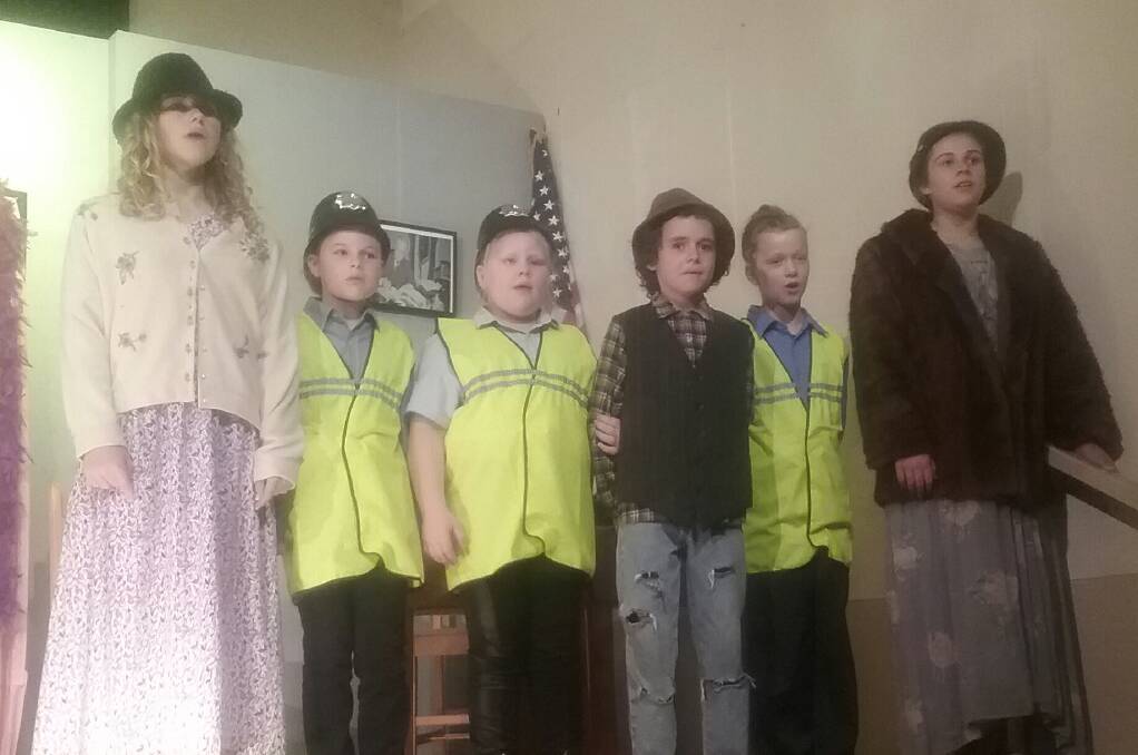 This looks like a mean group – who are they and why are they in the hands of the law – come along to Annie jr this weekend and find out