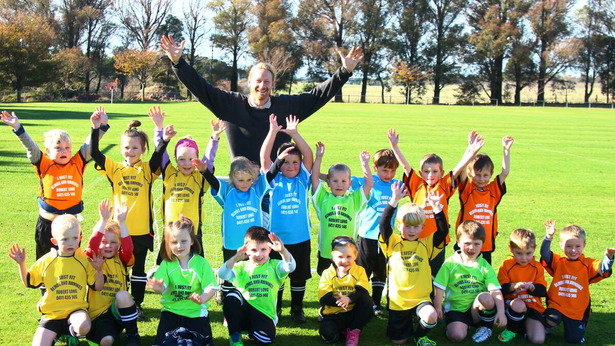 Photo of Robert Long, owner of I Just Fit Blinds & Awnings with excited D graders in their new soccer shirts.
I Just Fit Blinds ​and​ Awnings is proud to support the Crookwell Junior Soccer. Robert Long from I Just Fit Blinds ​and​ Awnings has been in the industry for over 14 years. The mobile business gives you a personalised, in home service. Whether you want internal blinds (roller, vertical venetian or roman), plantation shutters, external awnings or roller shutters, they have a product to suit your needs.
Call Robert on 0411435 146 for a free measure and quote.​

-- 