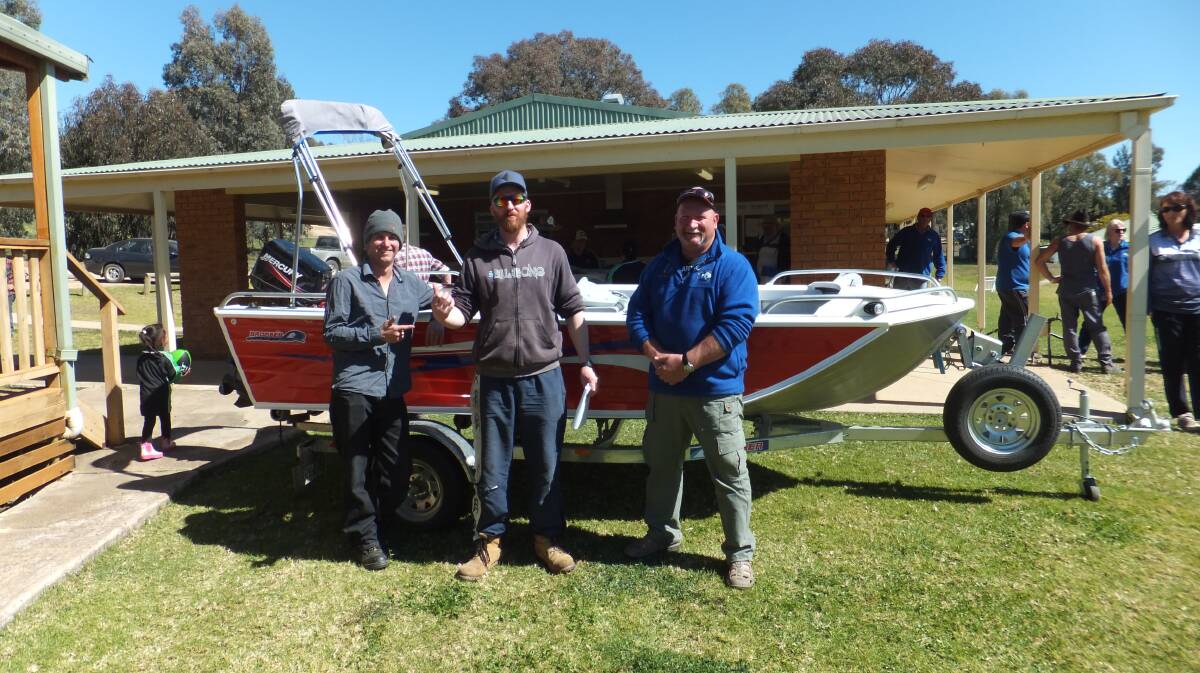 Peter Hempel of Blayney is now the proud owner of this year’s boat after being drawn out and Graham Hughs was the lucky winner of this year’s trailer full of camping equipment, pictured is Phil Cramp, Grabine Fishing Club President to the right