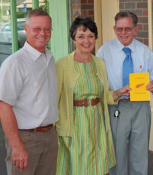 Mayor John Shaw OAM, MP Pru Goward and local identity Wal Redfern at his recent book launch outside the Christian Book Shop on Saturday.
Photo and story by Brendon RUTTER.