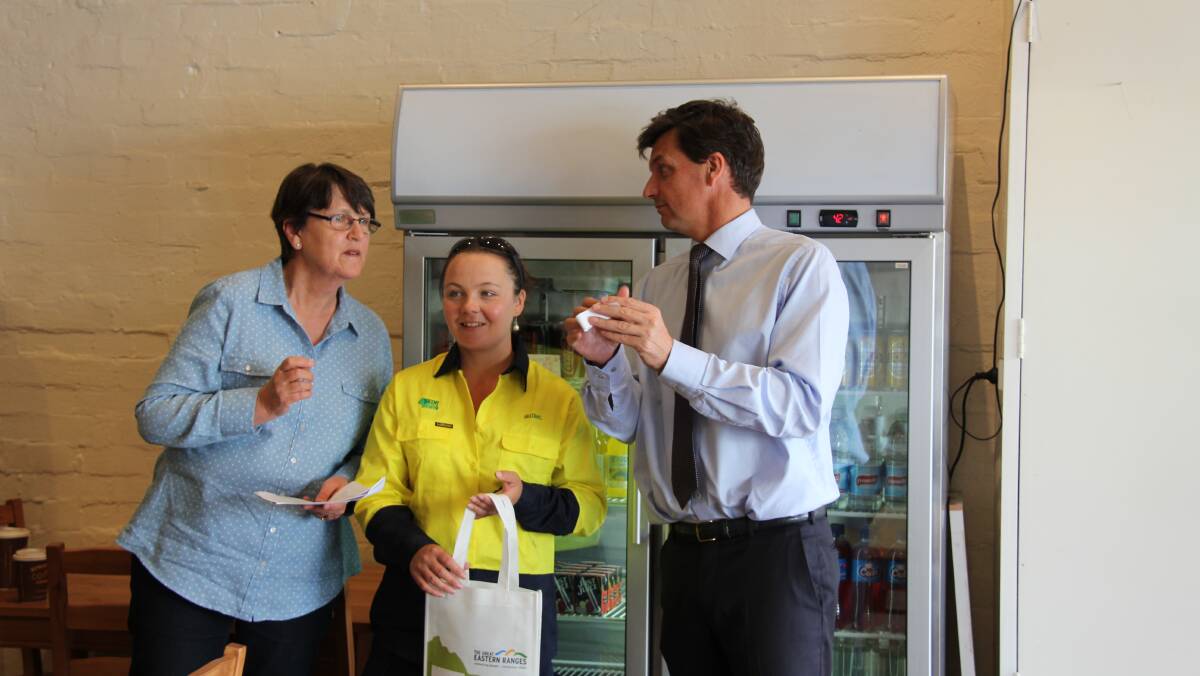And the winner is….. Tussock Tamers Lottery prize draw with Nerida Croker, Crookwell Green Army team leader, Amy-Lee Menzies and Angus Taylor MP.