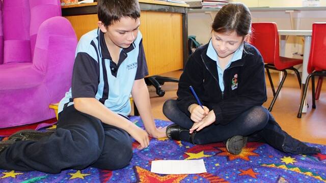 Peer Support: Seth Ross and Maddy Wray working together to list the qualities their friends display. Our Year 6 leaders have commenced Peer Support groups for the year. The focus of these sessions is developing and maintaining friendships. Students from Kindergarten to Year 5 are placed in groups with two Year 6 leaders. All students participate in weekly games and activities within their groups. Peer Support groups are great for students who need some social assistance and for Year 6 to build leadership qualities. 
