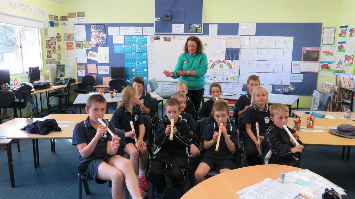RECORDER LESSONS - Throughout  the term the students have been learning to play recorder by Video Conferencing with teacher  Ms. Keva Abotomey from the Goulburn Regional Conservatorium.  Ms Abotomey visited the school the last week for a face to face lesson.   This program was funded by the Bigga Community Technology Centre.  Due to the success of the program Mrs. Coles has decided to continue the lessons via Video Conferencing into term 3 funded by the school. 