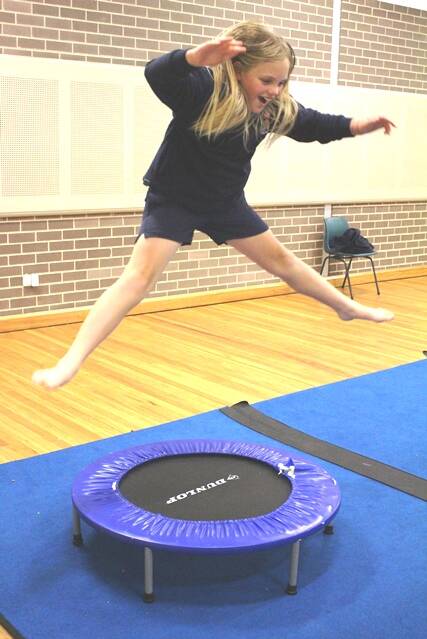 Gymnastics: Rhianna King practising her star jumps on the mini trampoline.During this term Crookwell Public School students have had the pleasure of attending gymnastics sessions. These sessions are led by gymnastics instructor Vaughn Edmonds, they aim to improve students’ flexibility, fitness and strength. 