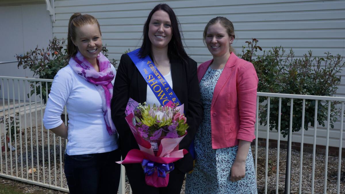 Claire (centre) with past Crookwell Showgirls Stephanie Willson, left, and Jasmine Nixon to the right.