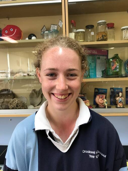 INQUIRING MIND: Crookwell High’s Lauryn Needham, pictured in the school laboratory,  has been named among 36 top science students in the region. Photo: supplied