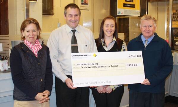 (Left to right) Karin Schaefer, Director of Nursing with Commonwealth Bank Manager, Noel Ottaway and member of staff, Libbie Storrier. Accepting the cheque is Denis Marshall (right) General Manager of Viewhaven Lodge, Crookwell.  