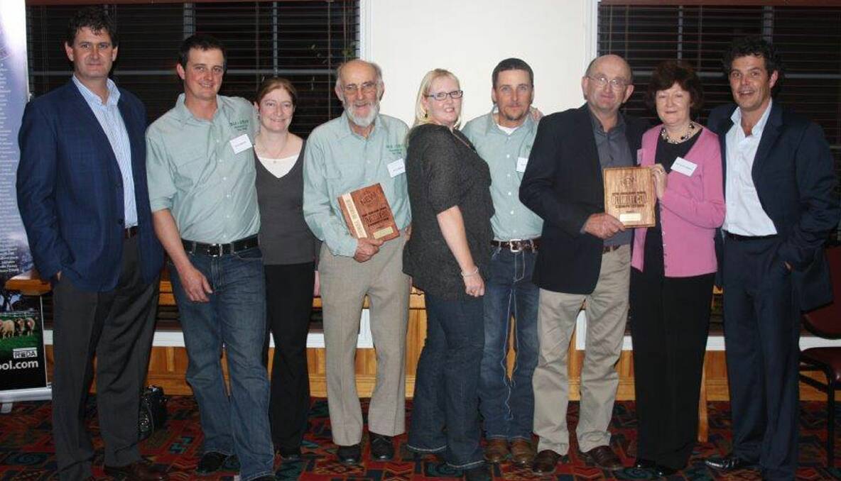 • Regional winners make competition history in the Ultimate Clip. (L-R) Andrew Blanch Managing Director New England Wool, David, Wendy, Wiley, Debra and Roy Reeves of ‘Biagrab’, Tony and Natalie Hewitt of ‘Galmara’ and Murray Bragg New England Wool.  