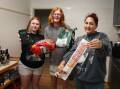 Meet the housemates who save on groceries by bulk-buying. They are, from left, Tamara Stewart, Charlie Seidel and Nadia Paige. Picture by Sylvia Liber