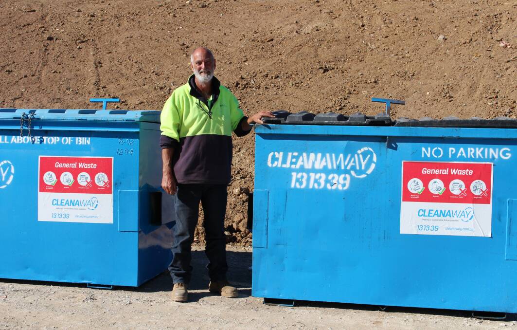 COMPLIANCE: Steve Trickett next to the new bins. Photo: Supplied.