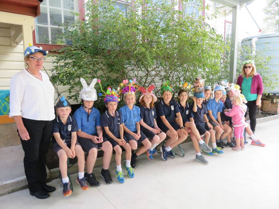 ART: Bigga Public School students with their colourful bonnets ready to wear for the Easter parade in early April. Photo: supplied