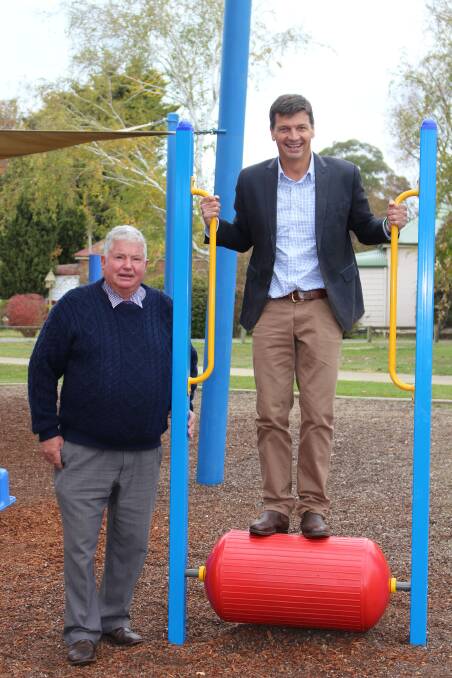 PLAYGROUND BOOST: Upper Lachlan Shire mayor Brian McCormack and Member for Hume Angus Taylor.  Photo: supplied.