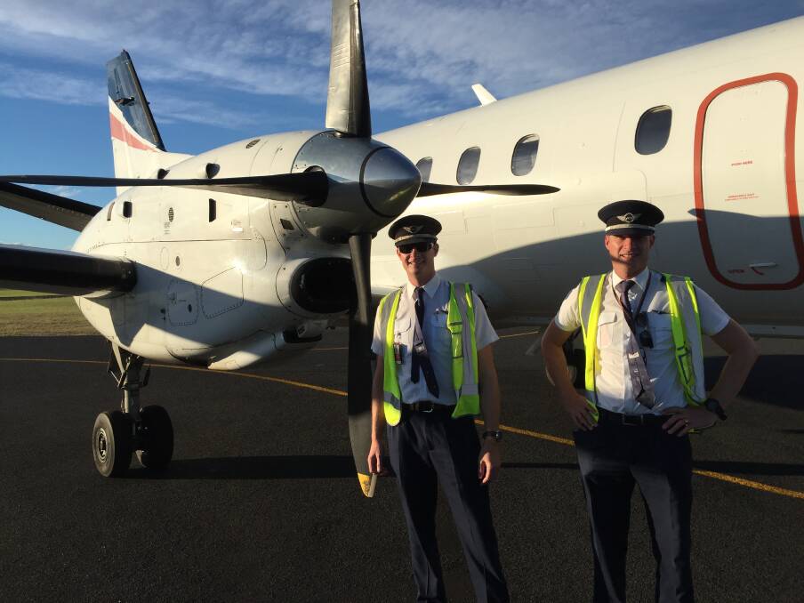 SKY HIGH: Twin brothers James and Michael Chamberlain share the same love for aviation. Photo: supplied. 