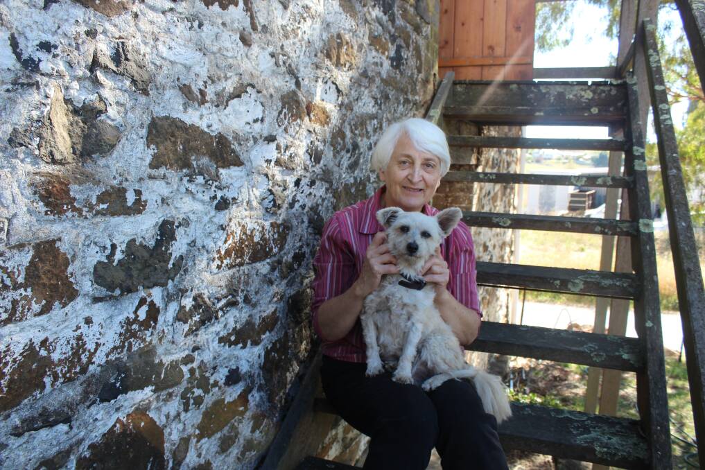 Owner of the Stephenson Mill Susan Hutton, pictured with her dog Rosie, plans to open the doors to the historic site once it has been renovated.
