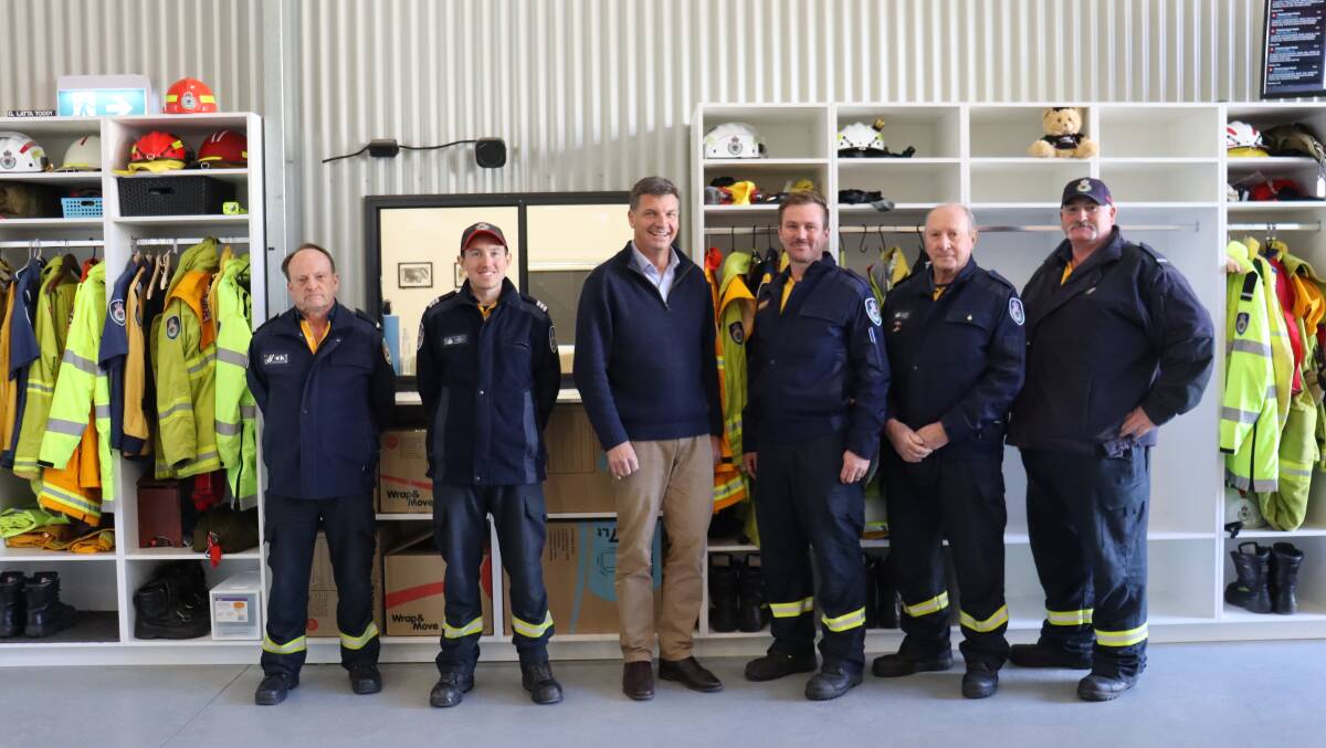 Federal MP for Hume Angus Taylor with members of the Goulburn Mulwaree RFS.