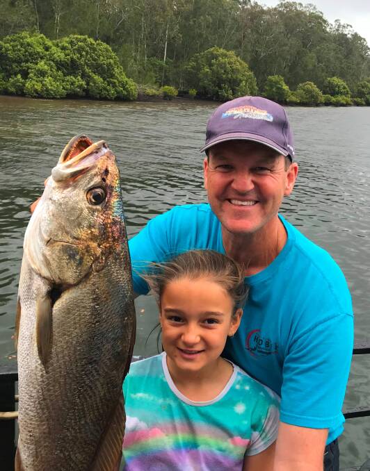 GOOD CATCH: Fishing Australia host Rob Paxevanos wirh his daughter Hayley and a good sized, Clyde River, estuary mulloway. Photo: Supplied by Rob Paxevanos