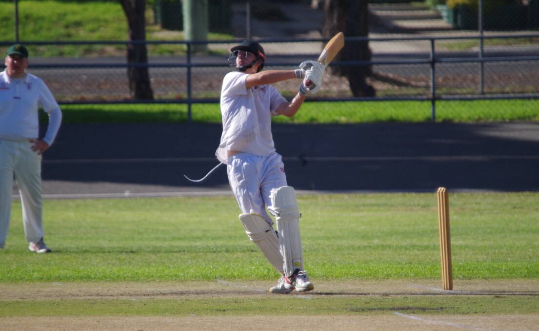BIG HIT: Crookwell's |Sam Cramp smashes the ball toward the outfield of Seiffert Oval in the final against Wollondilly last Saturday. Photo: Darryl Fernance