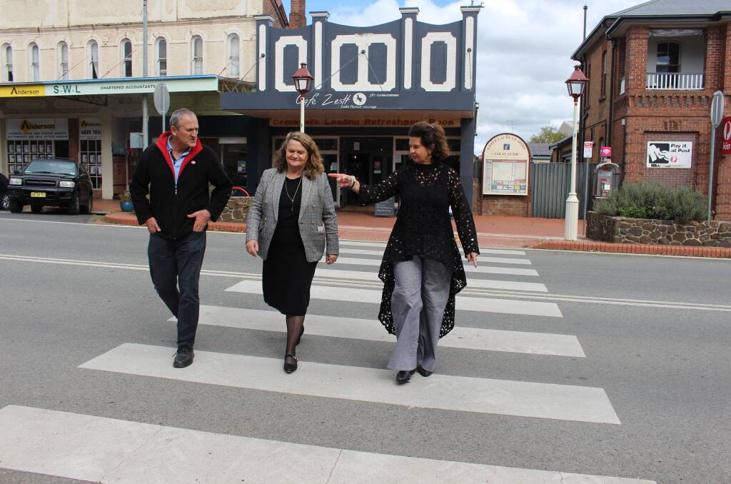 Businessman Floyd Davies, Goulburn MP Wendy Tuckerman and Mayor Pam Kensit on the Goulburn Street, Crookwell, pedestrian crossing earlier this year. The council is seeking feedback on proposed changes. Picture supplied.
