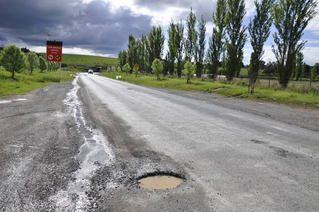 Goulburn Mulwaree Council has repaired potholes like this one that appeared on Garroorigang Road after heavy rain. Picture by Louise Thrower. 
