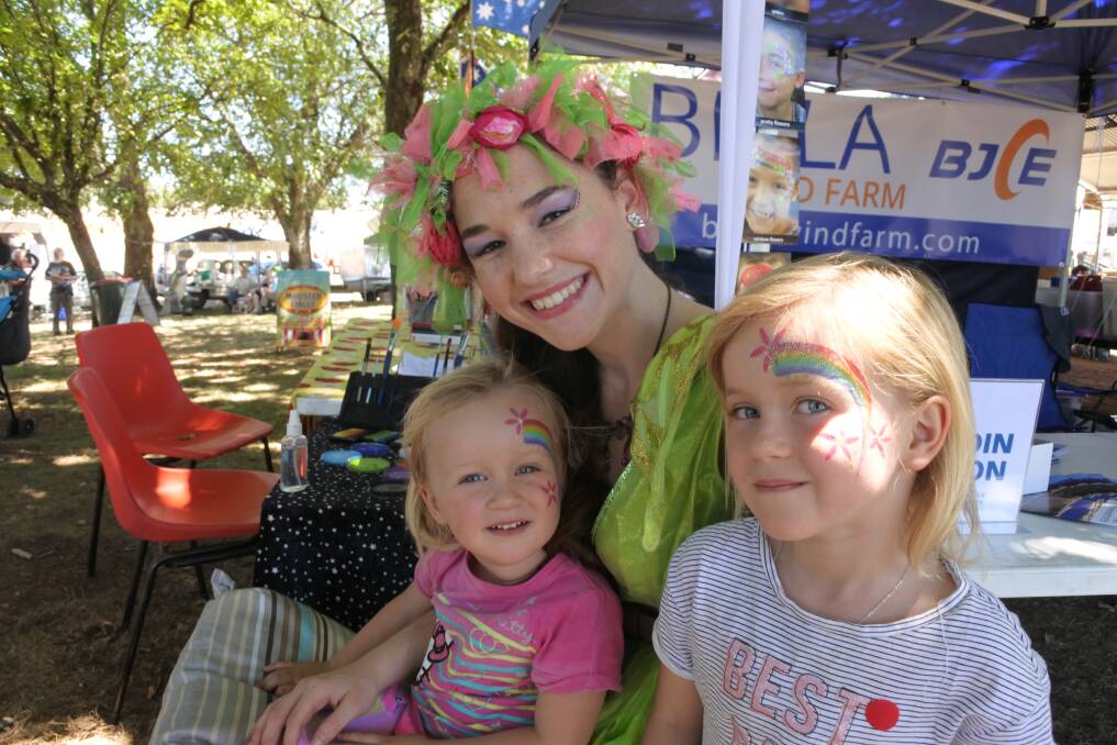 Pic of the week: Bronte Forester "Fairy BB" flew in from the ACT to paint the children's faces at the show on the weekend. Lucinda and Phoebe Fannin from Crookwell were over the rainbow with the faces painted. Photo Bronwyn Haynes.