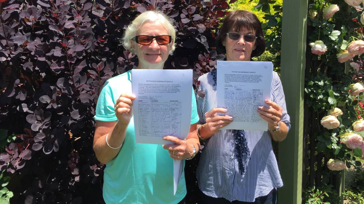 FOR GREEN WASTE: Anne Cummins and Anne Jackson with the petitions, submitted to the council with 1139 signatures in support of a green waste service.