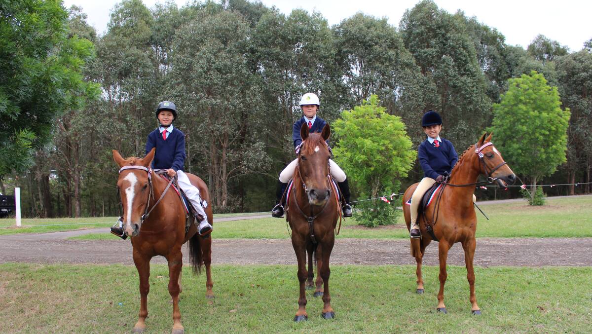 COMPETITORS: Cooper Burch, Kimberly Allport and Ella Anthony were proud to represent Crookwell Public School at the recent equestrian meet. Photo supplied.