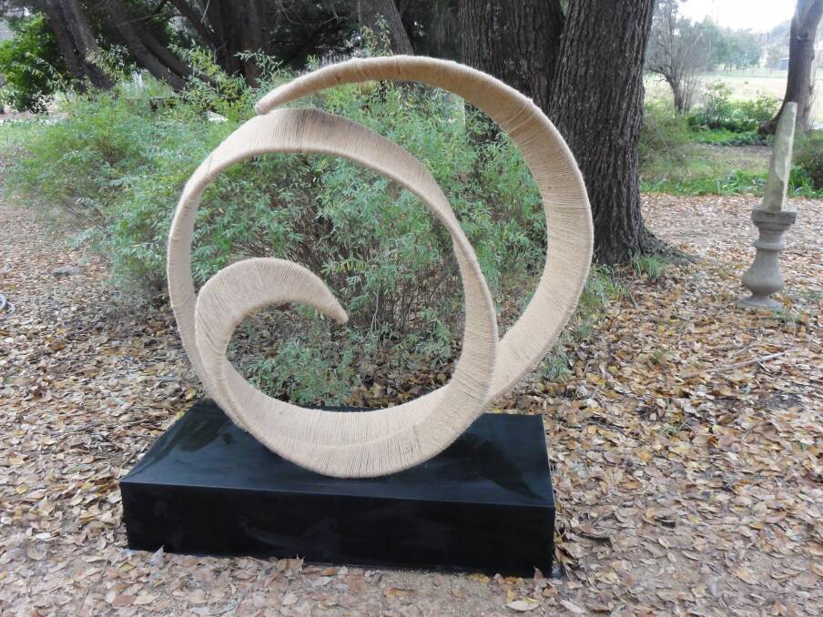 SCULPTURE: A spiral - one of Anna’s sculptures depicting the journey of beginning and endings that we journey to self acceptance.