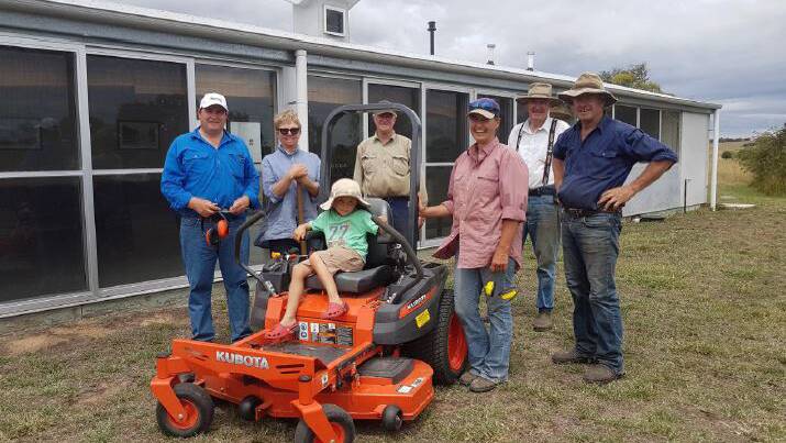 Moving forward: Breadalbane Hall Committee members with their new mower. L-R Michael de Kleuver, Jenny Bell, George de Kleuver, Angus McLean, Sally McLean, Chris Edwards and Rod Edwards.