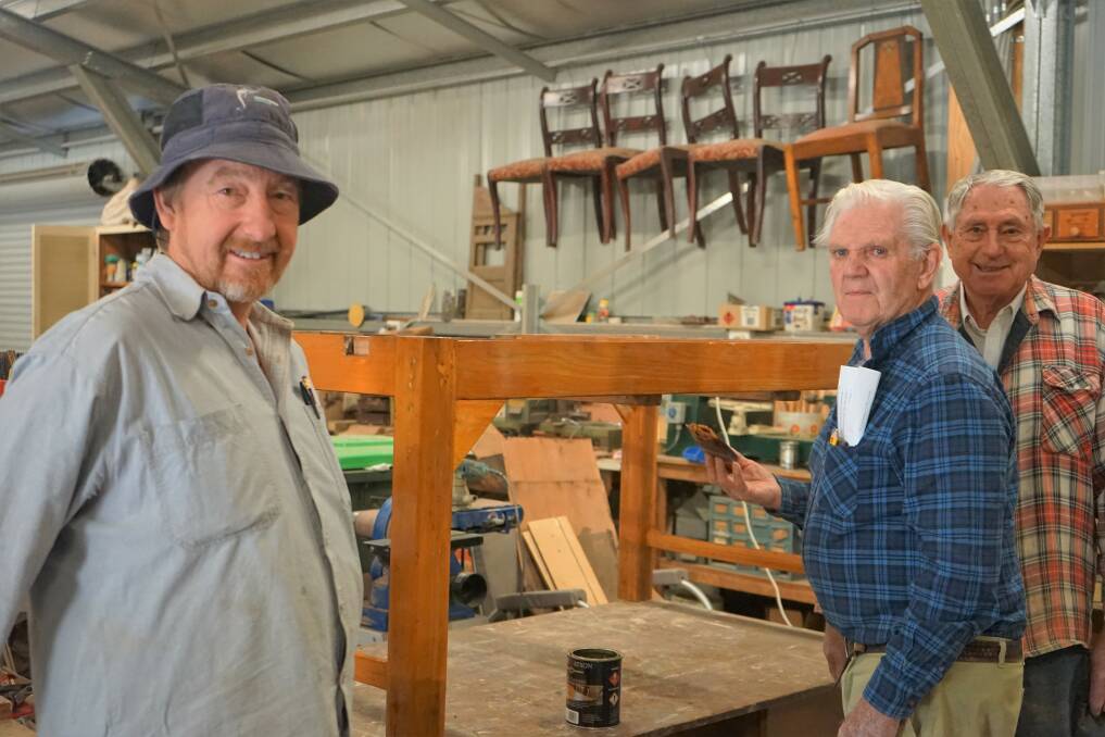 Community: Brett Ible, John Medway and Ron Browne at work at the Men's Shed. Photo: Clare McCabe