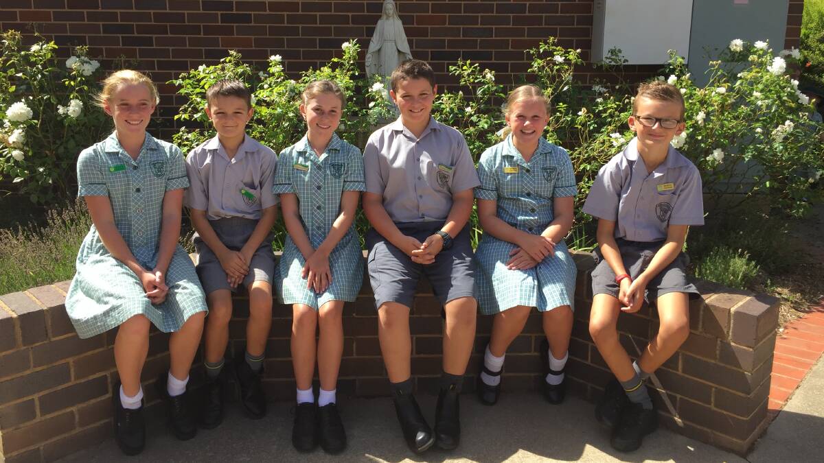 Return to 2019: St Mary's Primary School captains (L-R) Aloysius captains Paige Croker and Bradley Nagle, school captains Bella Croker and Archie Pursell, 
Lawrence captains Billie Skelly and Taj Cooper.