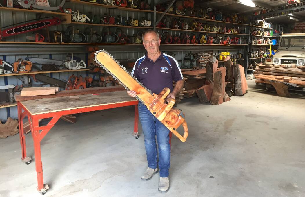 Hobby turned artist: Tony Evans' chainsaw collection progressed to carving wooden art and furniture.