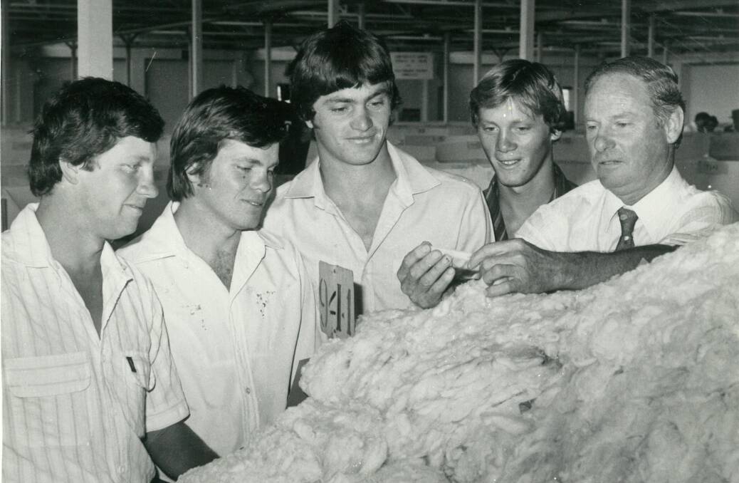 Wool dynasty: The late Trevor Picker (right) with sons Danny, Murray, Grant and Brett at wool sales in Goulburn in 1982. Photo: Leon Oberg