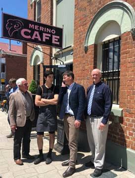Testing out the new 4G mobile coverage: Federal Member for Hume Angus Taylor with Upper Lachlan Shire Mayor John Stafford, General Manager John Bell and Gunning resident and Merino Café staff member Chris Young.